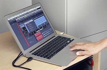 A laptop computer running a DAW application | Tascam MX-8A